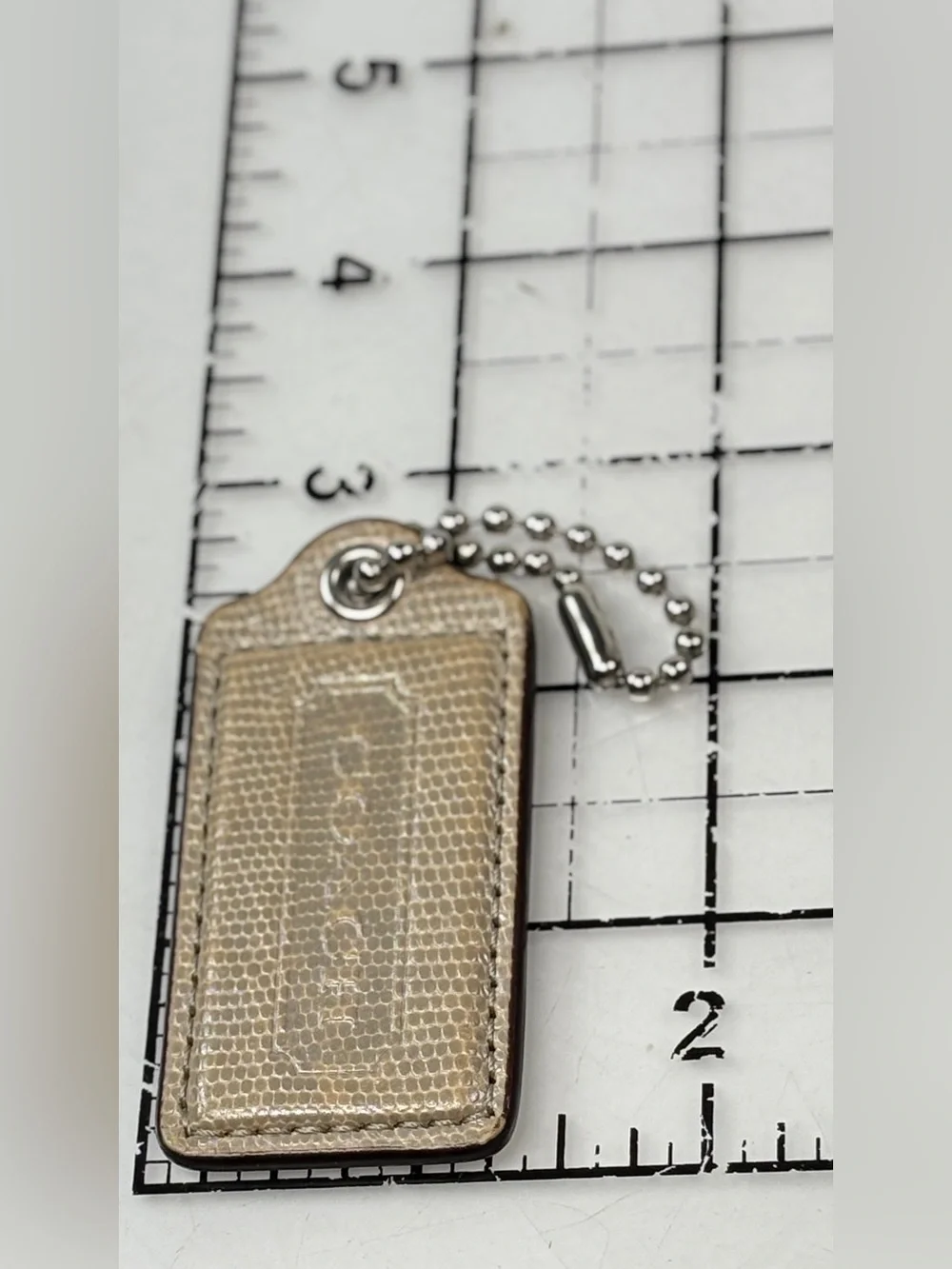 Coach snake embossed tan leather beige hang tag brown Silver chain 2.5 x 1.25 I